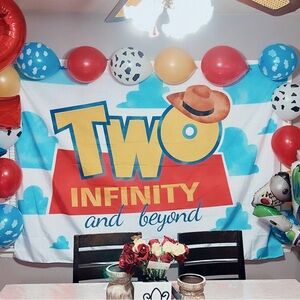Two Infinity and Beyond backdrop.